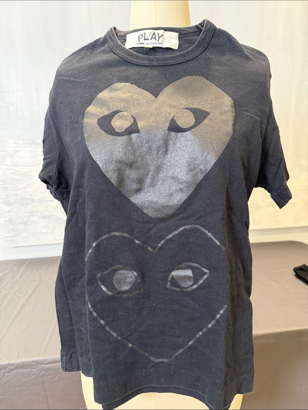 Comme des Garçons Black Tee with Metallic Silver Heart Eyes